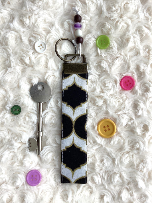 Geometric Gold, White & Black Wristlet