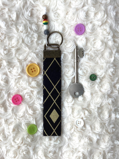 Black & Gold Geometric Wristlet
