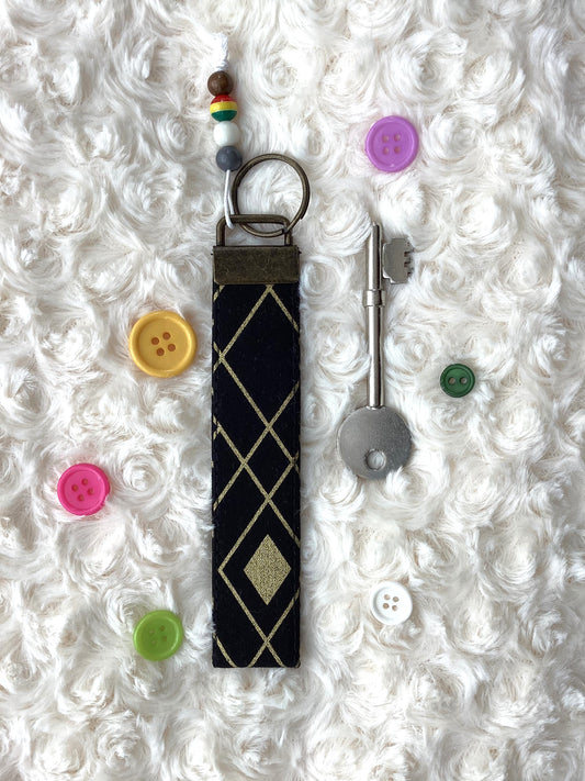 Black & Gold Geometric Wristlet
